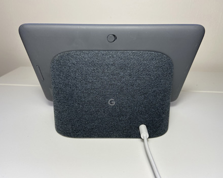 Google Nest router sitting on a desk at home